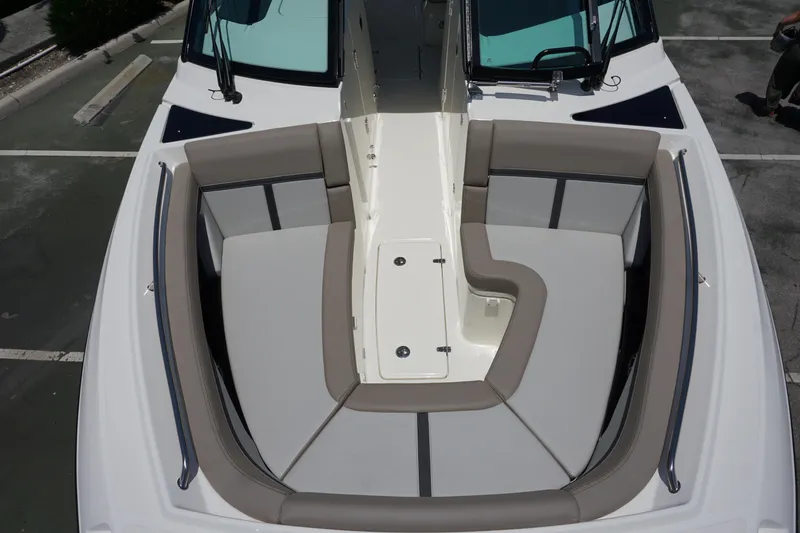 Slide: The Image of 2025 Boston Whaler 330 Vantage boat with spacious bow seating area. - 67