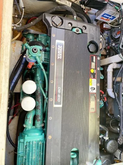 Slide: The Image of 1986 Wilbur 34 engine compartment with Volvo Penta marine engine. - 27