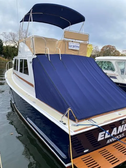 Slide: The Image of 1986 Wilbur 34 boat with blue canopy, for sale in Annapolis. - 4