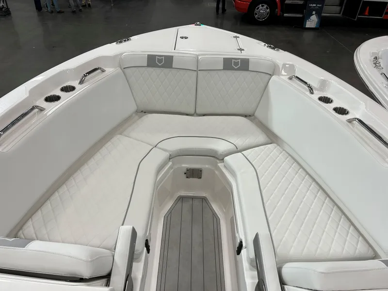 Slide: The Image of 2025 Sea Fox 268 Traveler boat interior with white cushioned seating and sleek design. - 10