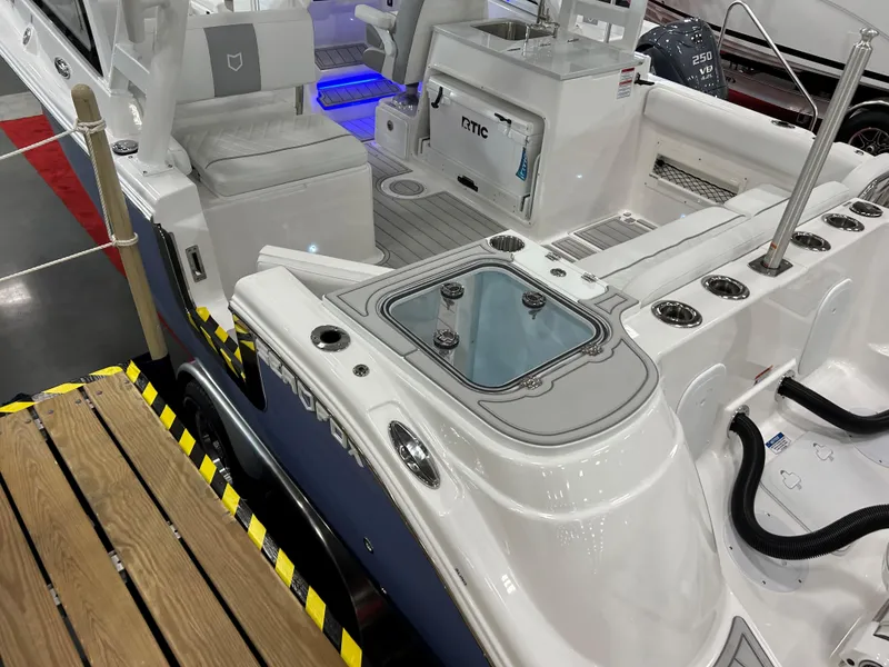 Slide: The Image of 2025 Sea Fox 268 Traveler boat interior with seating and storage features. - 18