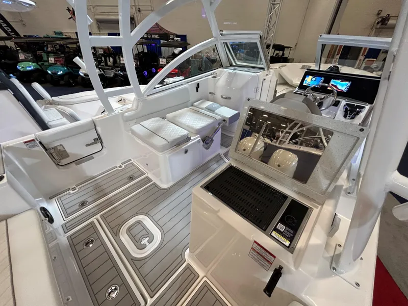 Slide: The Image of 2025 Sea Fox 268 Traveler boat interior with seating and control panel. - 22