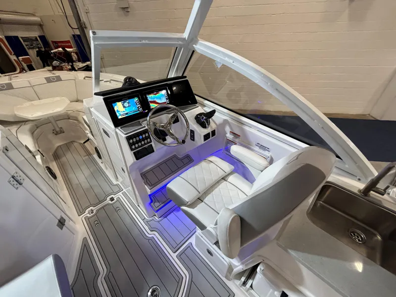 Slide: The Image of 2025 Sea Fox 268 Traveler boat interior with modern dashboard and seating. - 23