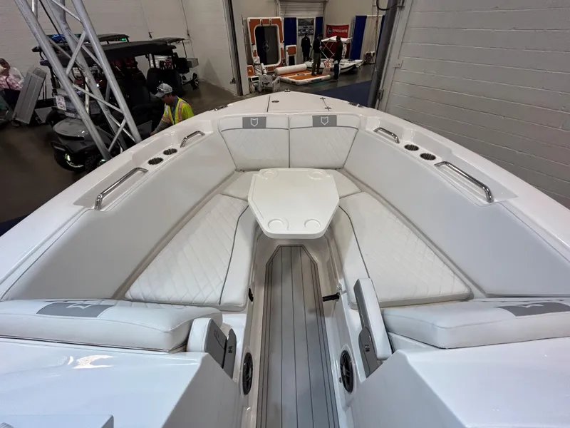 Slide: The Image of 2025 Sea Fox 268 Traveler boat interior with white seating and sleek design. - 25