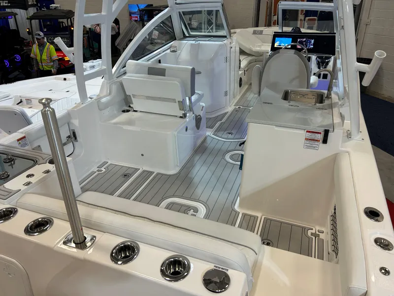 Slide: The Image of 2025 Sea Fox 268 Traveler boat interior with seating and control panel. - 29
