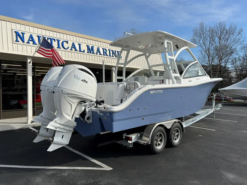 Slide: The Image of 2025 Sea Fox 268 Traveler boat with twin Yamaha engines at Nautical Marine dealership. - 7
