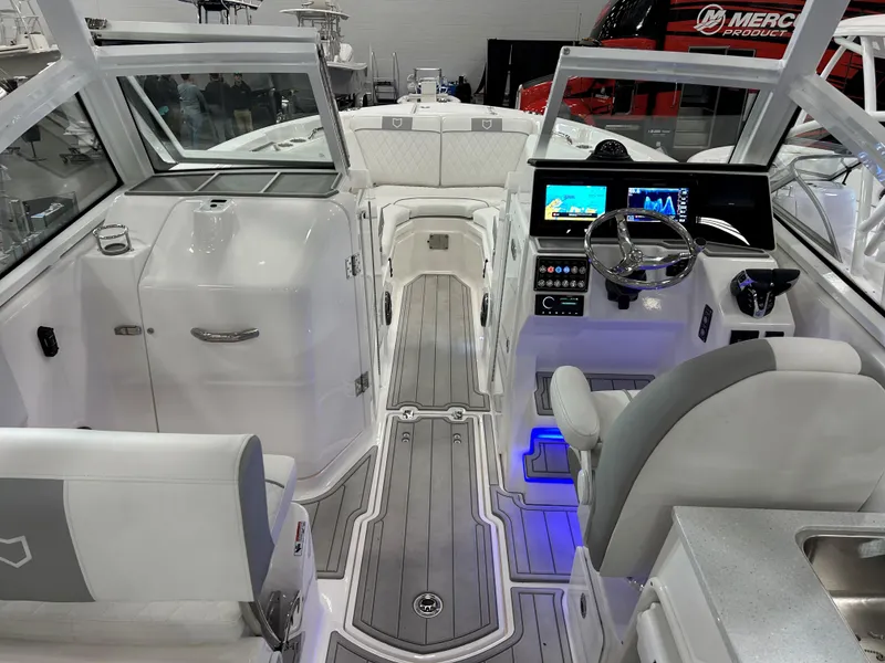 Slide: The Image of 2025 Sea Fox 268 Traveler boat interior with modern dashboard and seating. - 9