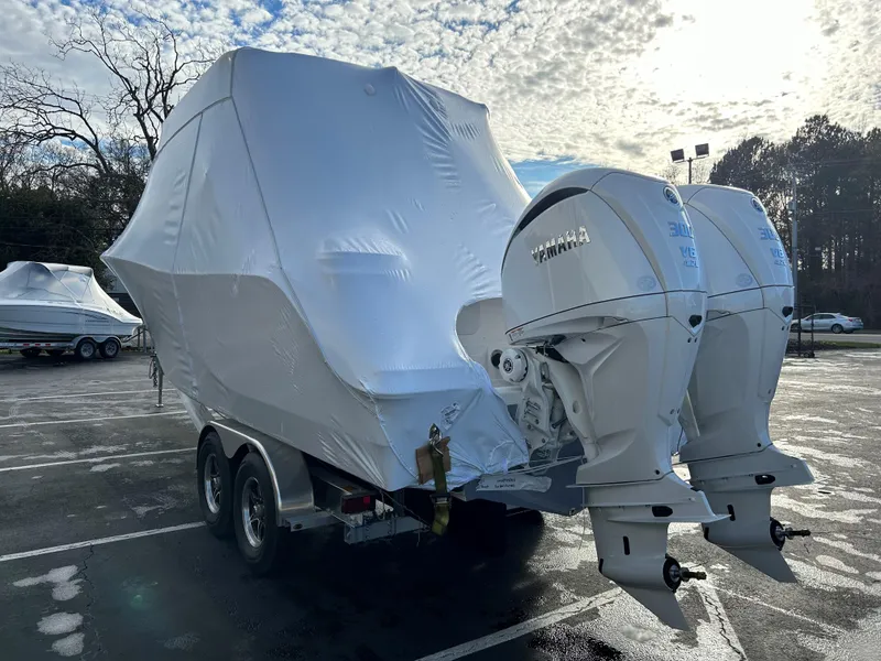 Slide: The Image of 2025 Sea Fox 288 Traveler boat covered, on trailer, with twin Yamaha outboard engines. - 12
