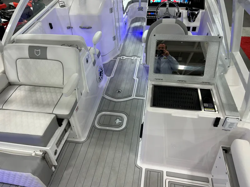 Slide: The Image of Interior of 2025 Sea Fox 288 Traveler boat with modern seating and control panel. - 5