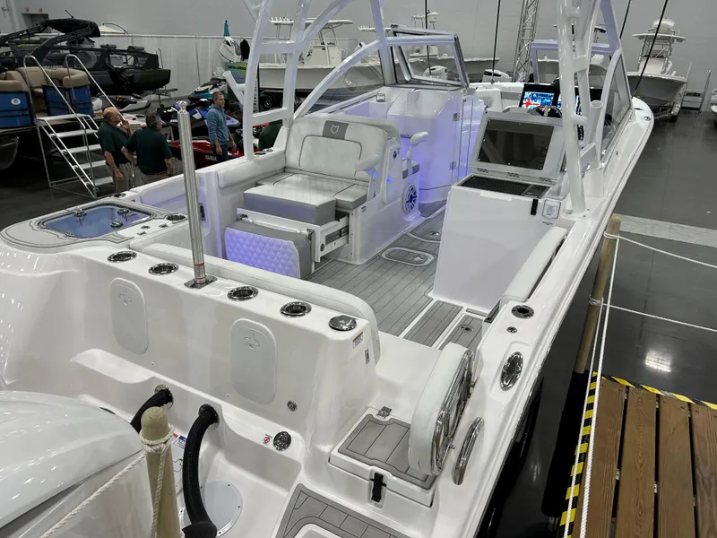 Slide: The Image of 2025 Sea Fox 288 Traveler boat interior with modern seating and controls. - 7