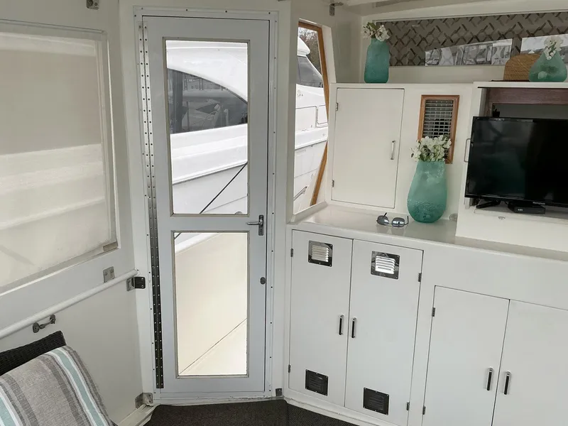 Slide: The Image of Interior of 2000 Novatec Islander 55 yacht with modern decor and cabinetry. - 14
