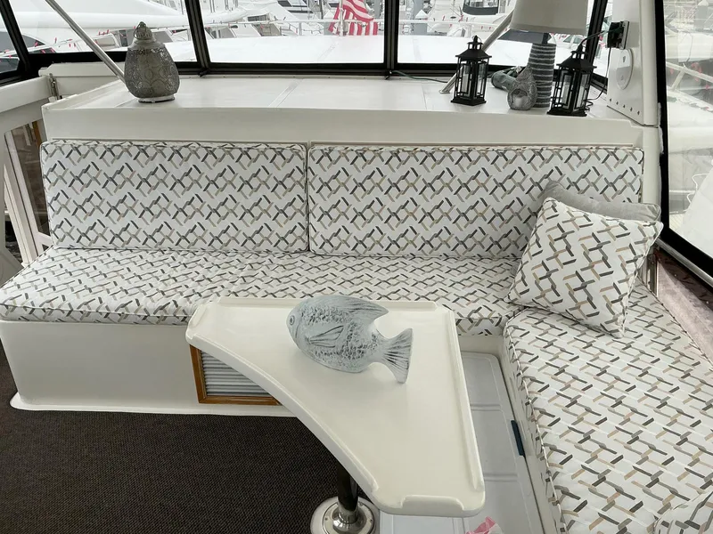 Slide: The Image of Novatec Islander 55 yacht interior with patterned seating and decorative elements, 2000 model. - 20