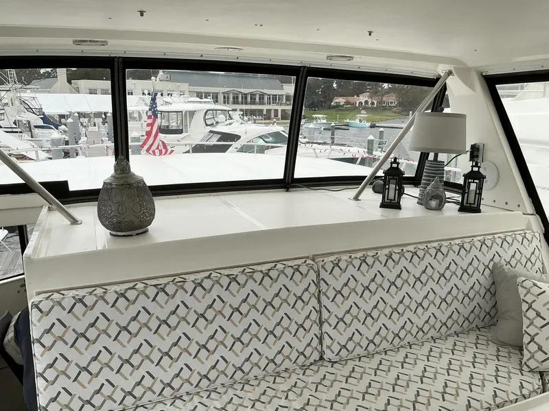 Slide: The Image of Interior of 2000 Novatec Islander 55 yacht with patterned seating and decorative accents. - 21