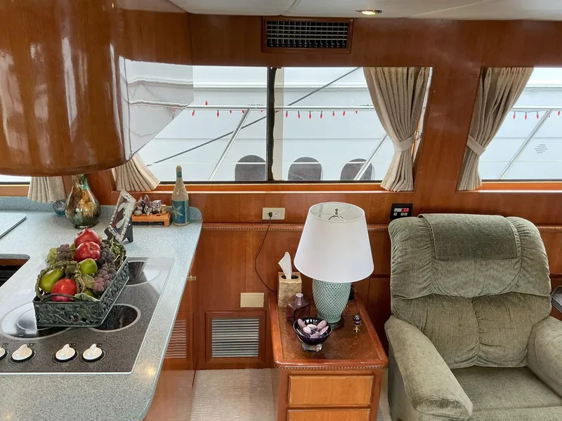 Slide: The Image of Interior of 2000 Novatec Islander 55 yacht with cozy seating and elegant decor. - 29