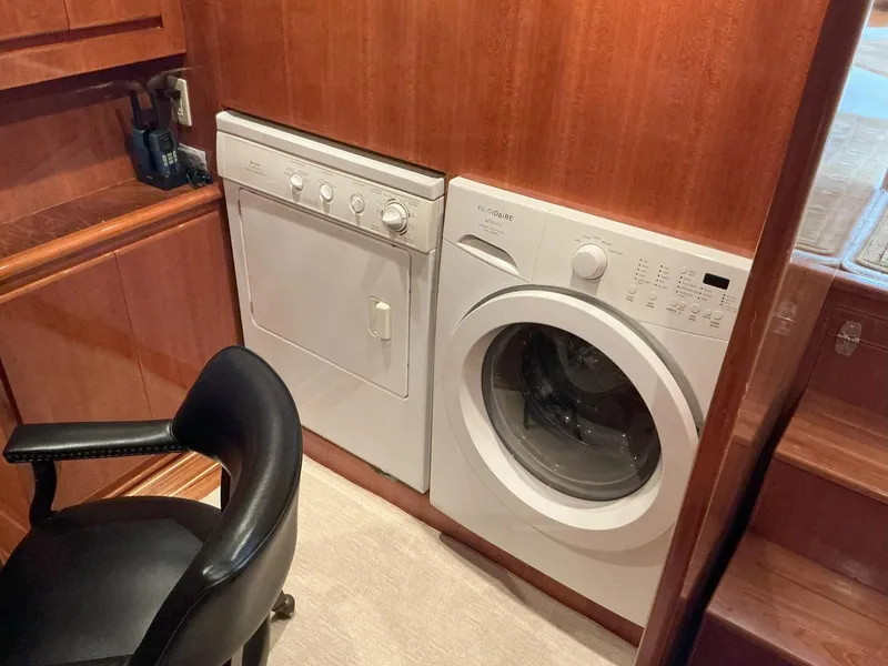 Slide: The Image of Laundry area in 2000 Novatec Islander 55 yacht with washer and dryer. - 38