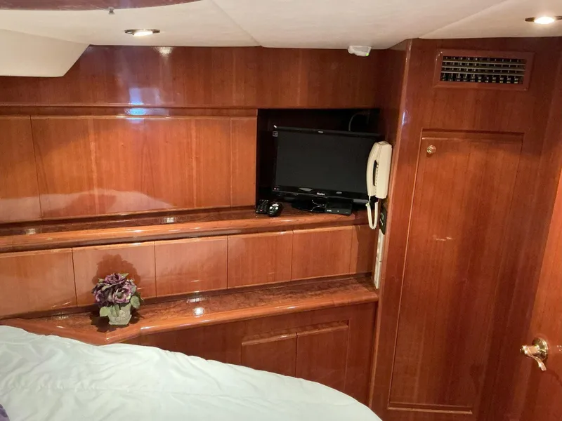 Slide: The Image of Luxurious cabin interior of 2000 Novatec Islander 55 yacht with wood paneling. - 42