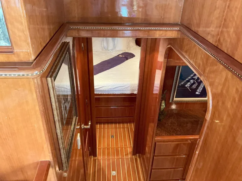 Slide: The Image of Interior view of 2000 Novatec Islander 55 yacht with polished wood finish. - 44