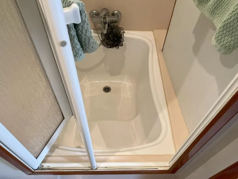 Slide: The Image of Shower area in 2000 Novatec Islander 55 yacht, featuring compact design and fixtures. - 45