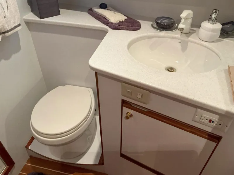 Slide: The Image of Bathroom interior of 2000 Novatec Islander 55 yacht with sink and toilet. - 49