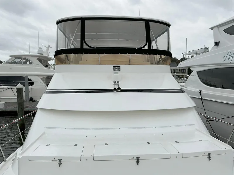 Slide: The Image of Novatec Islander 55 yacht, 2000 model, docked at marina with overcast sky. - 6