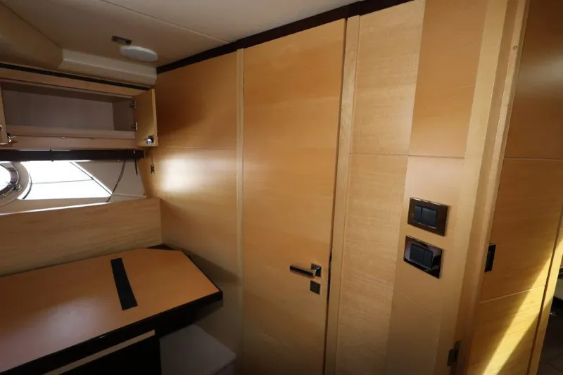 Slide: The Image of Interior of 2014 Sunseeker San Remo yacht with wooden cabinetry and modern design. - 15