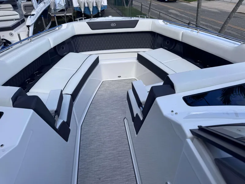 Slide: The Image of 2025 Cobalt R35 boat interior with luxurious seating and modern design. - 8