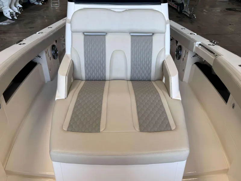 Slide: The Image of Luxurious seating on 2025 Solace 32 CS boat, featuring elegant design and comfortable upholstery. - 9