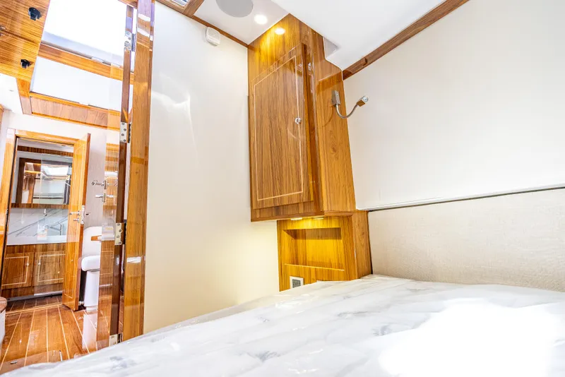 Slide: The Image of Luxurious cabin interior of 2025 HCB 65 Estrella yacht with wood finishes. - 25