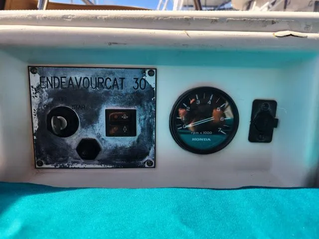 Slide: The Image of Control panel of 1992 Endeavourcat 30 catamaran with Honda RPM gauge. - 23