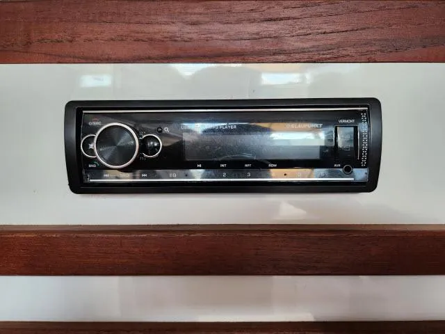 Slide: The Image of Stereo system on 1992 Endeavourcat 30 catamaran, mounted on wooden panel. - 7