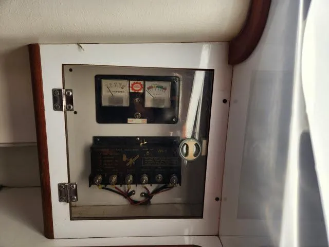 Slide: The Image of Electrical panel of a 1992 Endeavour Catamaran Endeavourcat 30 with gauges and wiring. - 9