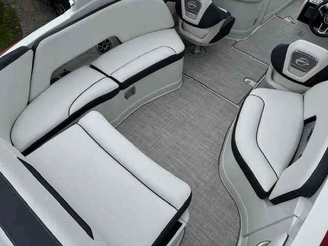 Slide: The Image of 2025 Crownline 280 SS boat interior with sleek white seating and modern design. - 10