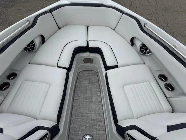 Slide: The Image of Luxurious seating in the 2025 Crownline 280 SS boat, featuring sleek white upholstery. - 14
