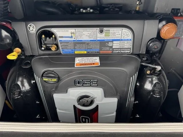 Slide: The Image of Engine compartment of a 2025 Crownline 280 SS boat, featuring a Mercury 350 engine. - 18