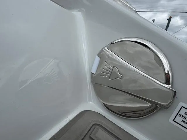 Slide: The Image of Chrome fuel cap on 2025 Crownline 280 SS boat, featuring sleek design and modern aesthetics. - 7