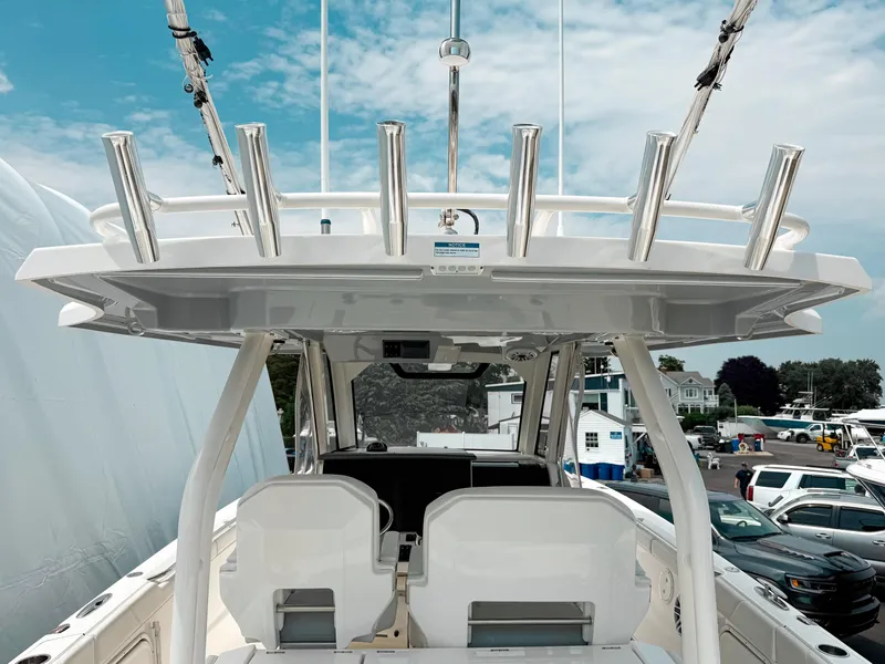 Slide: The Image of 2022 Pursuit S 328 Sport boat with sleek design and modern features. - 16