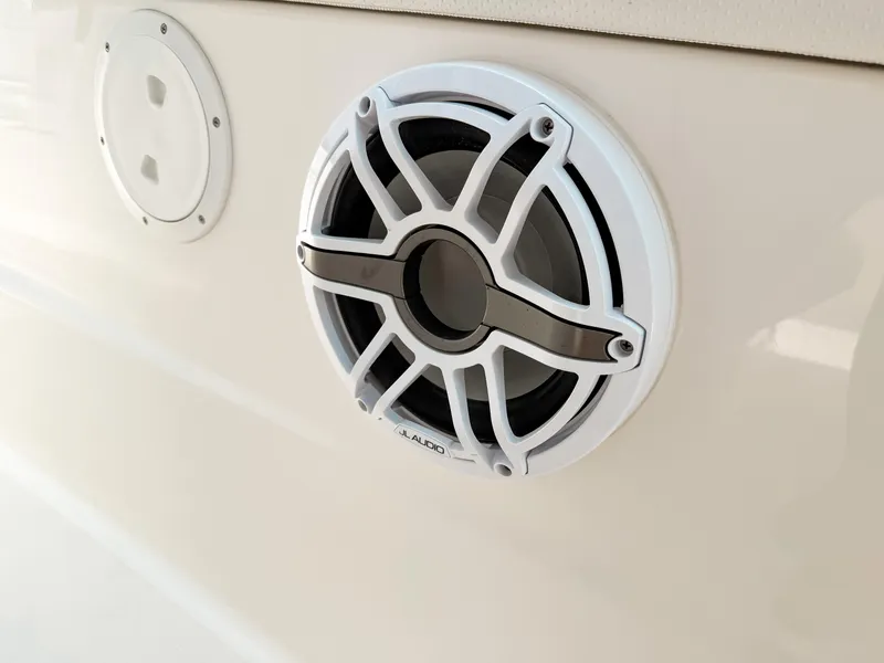 Slide: The Image of 2022 Pursuit S 328 Sport boat speaker detail on white exterior. - 30