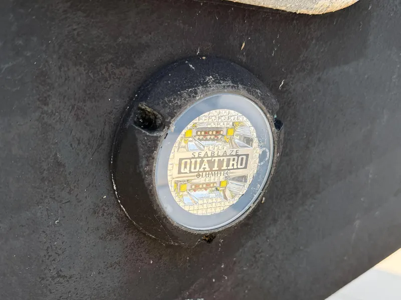 Slide: The Image of Close-up of SeaBlaze Quattro underwater light on 2022 Pursuit S 328 Sport boat. - 43