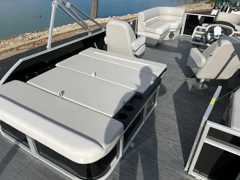 Slide: The Image of 2025 Godfrey XPERIENCE 2286 SFLC pontoon boat interior with seating and helm. - 16