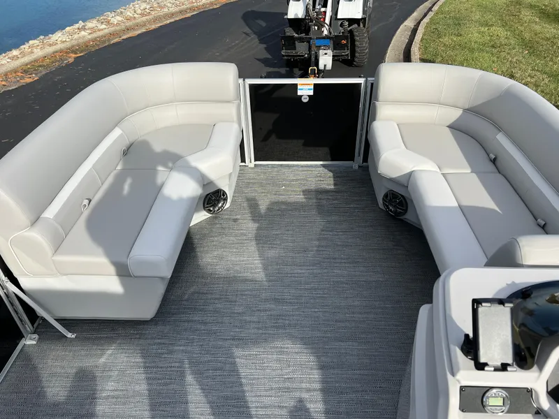 Slide: The Image of 2025 Godfrey XPERIENCE 2286 SFLC pontoon boat interior with plush seating and modern design. - 20