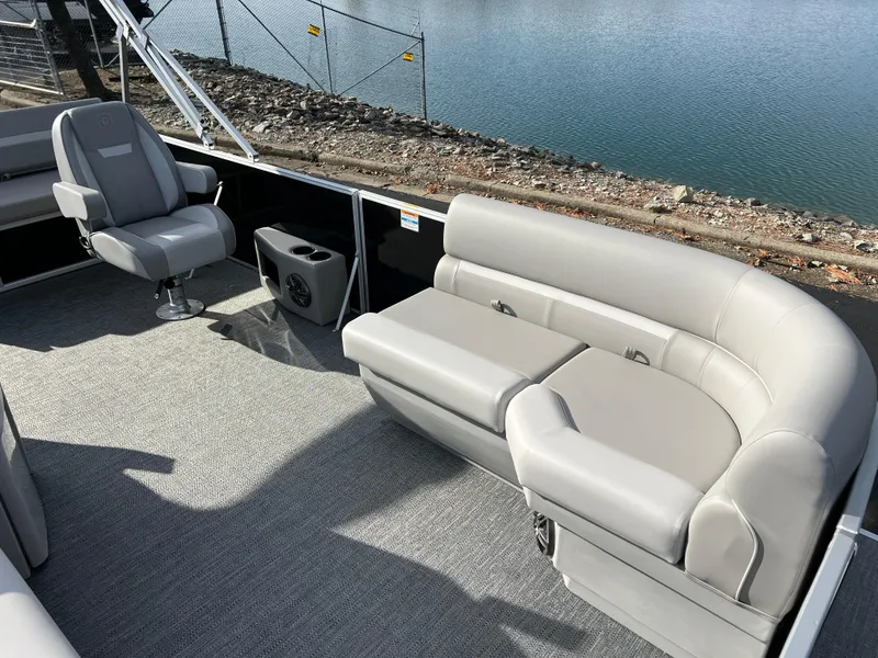 Slide: The Image of Interior of 2025 Godfrey XPERIENCE 2286 SFLC pontoon boat with gray seating. - 8