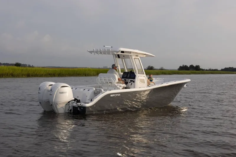 Slide: The Image of 2025 Sea Fox 268 Commander boat cruising on calm water. - 11
