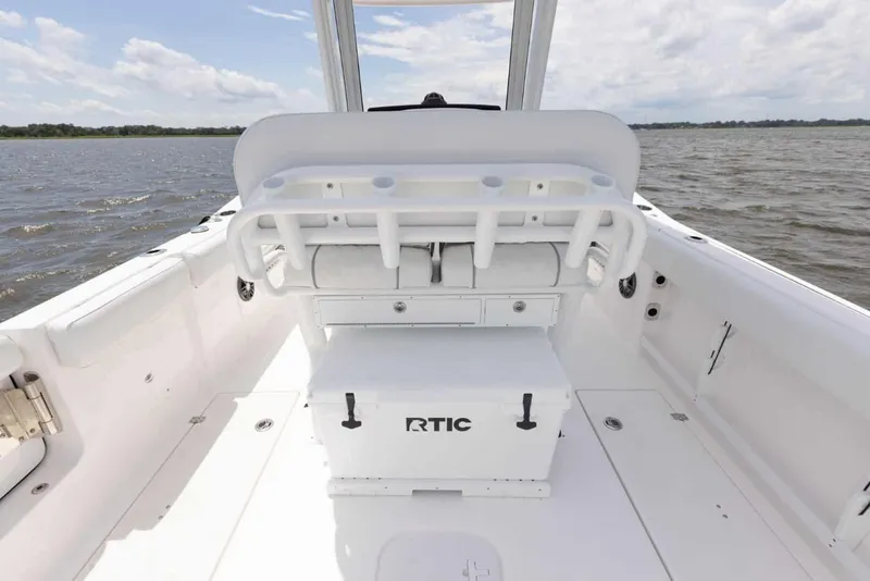 Slide: The Image of 2025 Sea Fox 268 Commander boat interior with RTIC cooler on deck. - 14