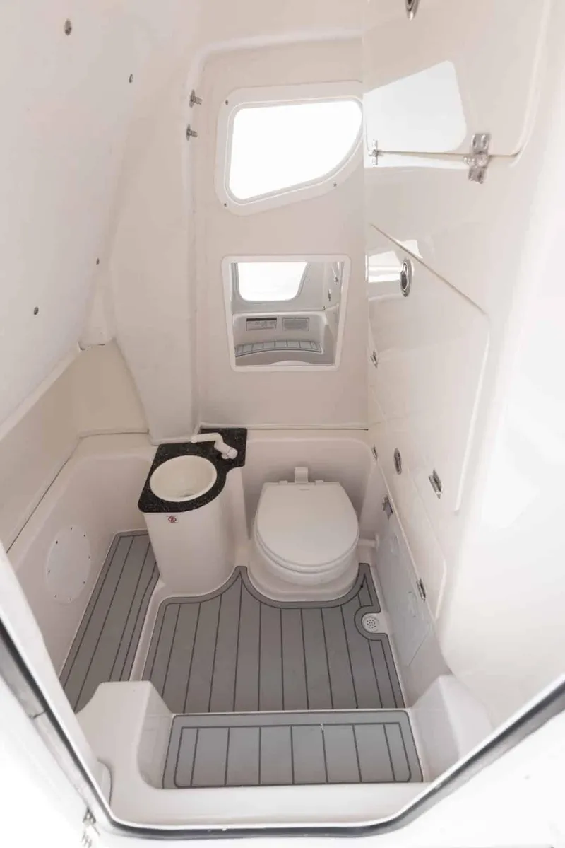 Slide: The Image of 2025 Sea Fox 268 Commander boat interior bathroom with modern fixtures and sleek design. - 15