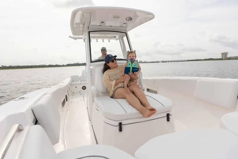Slide: The Image of Family enjoying a day on a 2025 Sea Fox 268 Commander boat. - 16