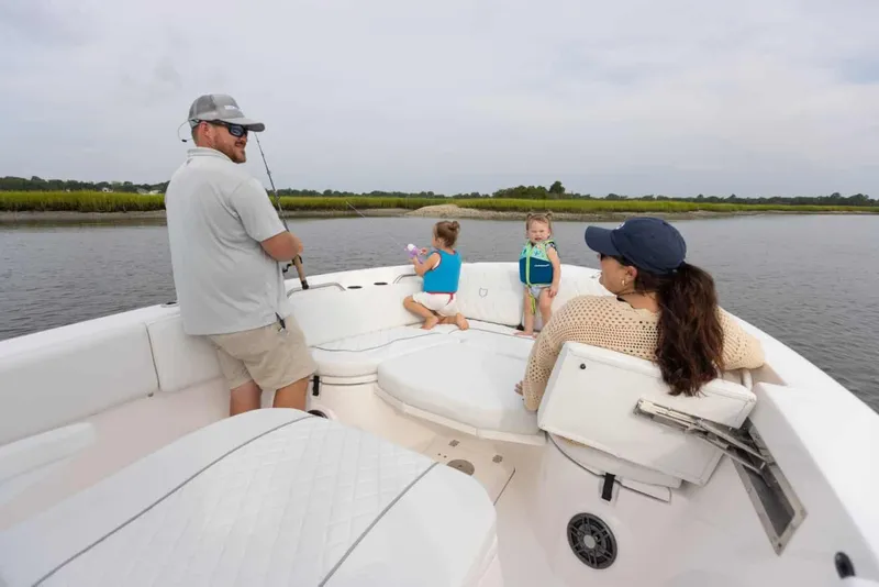 Slide: The Image of Family enjoying a day on a 2025 Sea Fox 268 Commander boat. - 17