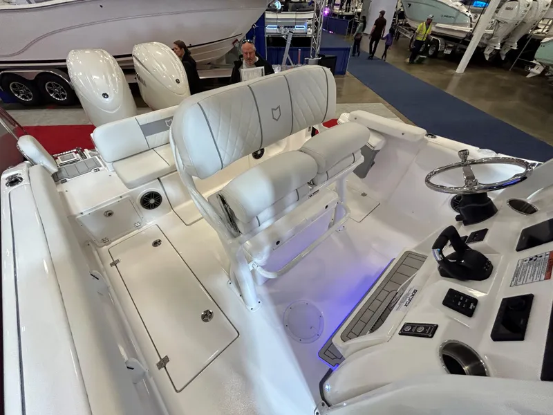 Slide: The Image of 2025 Sea Fox 268 Commander boat interior with dual engines and modern helm controls. - 19