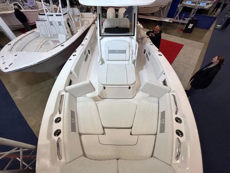 Slide: The Image of 2025 Sea Fox 268 Commander boat interior with white seating and modern design. - 22