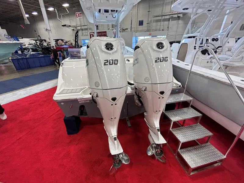 Slide: The Image of 2025 Sea Fox 268 Commander with twin 200 horsepower engines on display. - 23