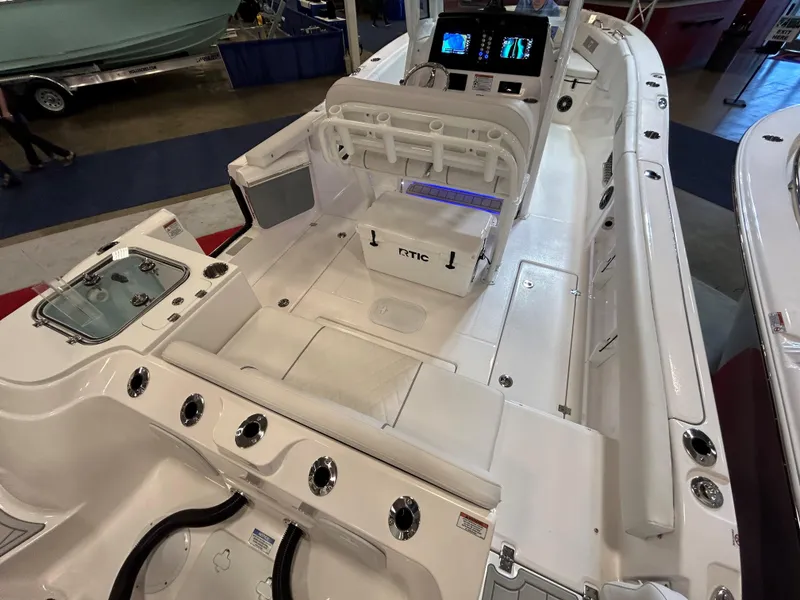 Slide: The Image of 2025 Sea Fox 268 Commander boat interior with seating and control panel. - 24